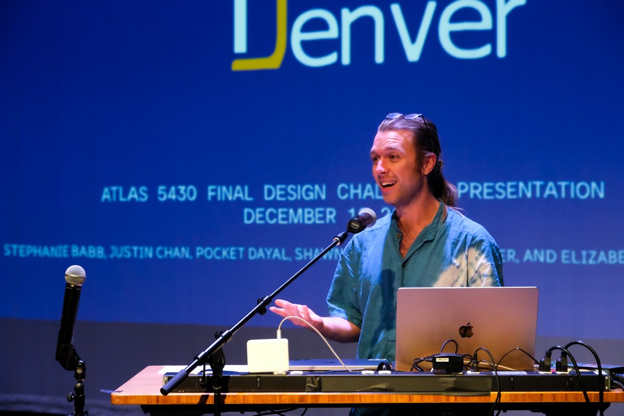 Aaron Neyer presenting the Give5 Mile High ATLAS final design review