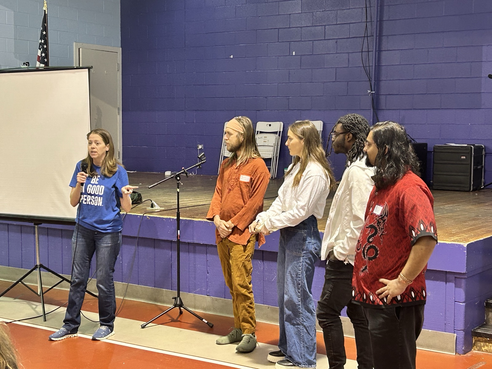 First Lady Courtney Johnston introducing the Give5 Mile High team on stage